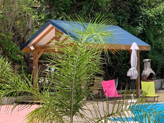Apartamento para 4 pers. con piscina compartida y jardín en Le Gosier