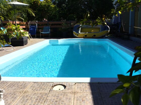Villa pour 10 pers. avec piscine partagée et terrasse à Le Tampon