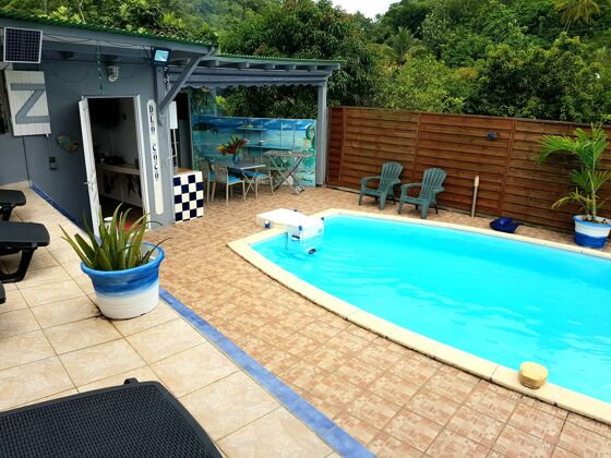 Bonita casa para 2 pers. con piscina, jardín y terraza en Les Abymes