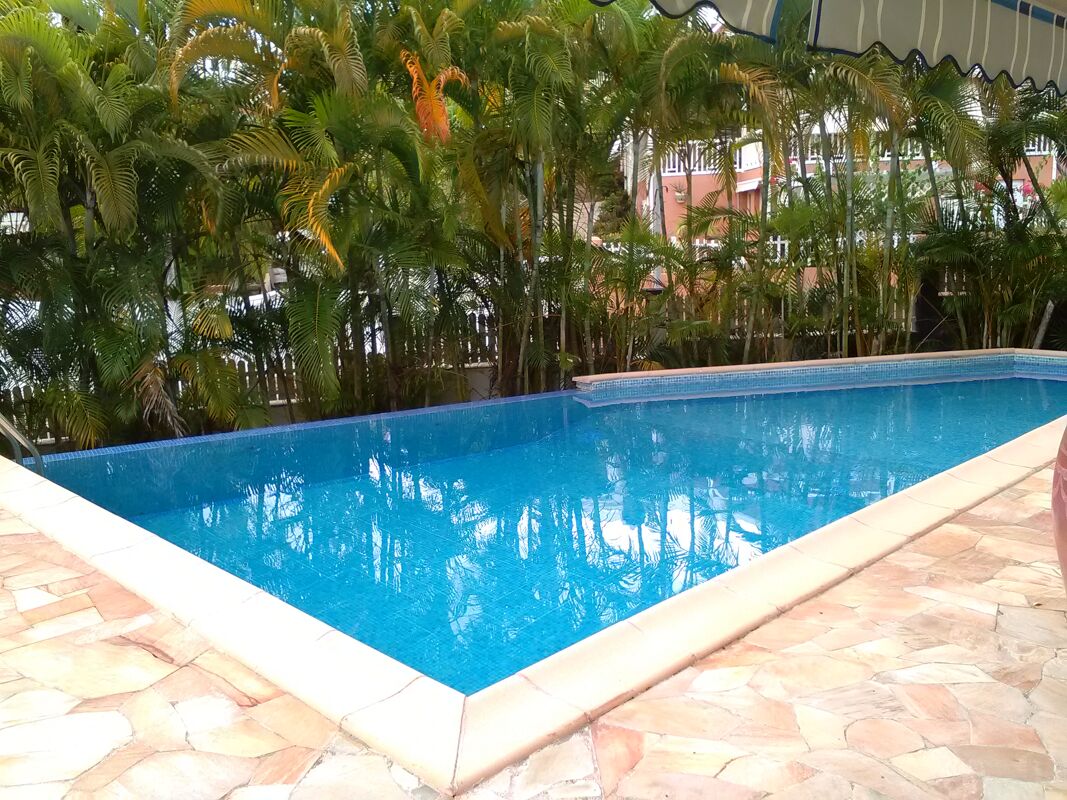 Vista a la piscina Bungaló Le Gosier