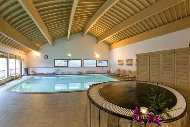 Apartamento para 4 pers. con piscina compartida, sauna, jacuzzi y spa