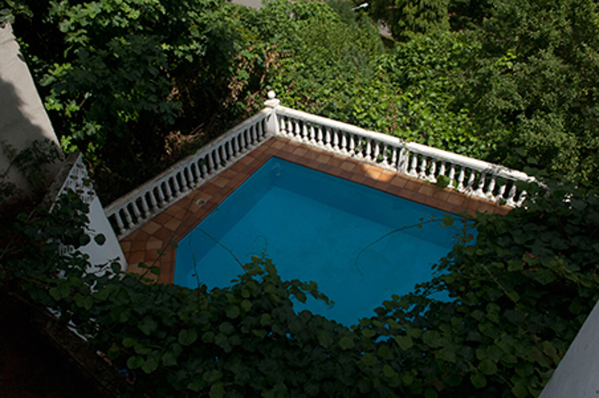 Vista a la piscina Apartamento San Antolin de Ibias