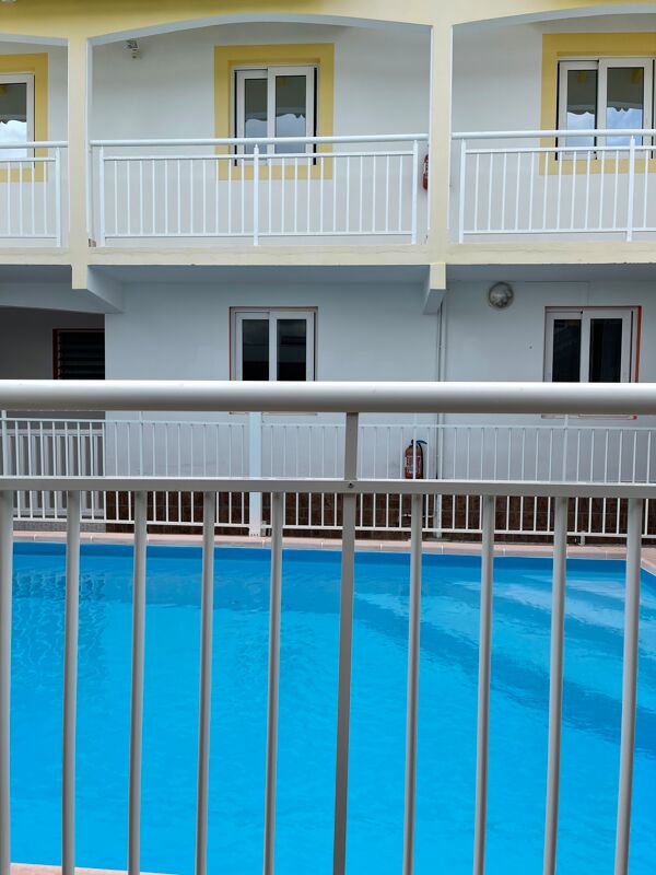 Swimming pool view Apartment Sainte-Anne
