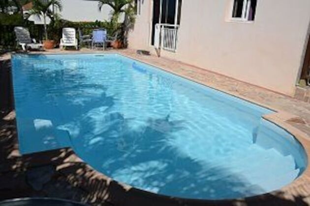 Apartamento a 1 km de la playa para 4 pers. con piscina compartida