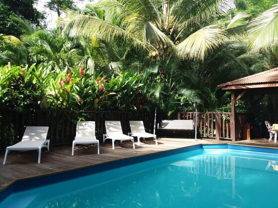 Nice bungalow for 4 ppl. with shared pool and terrace at Pointe-Noire